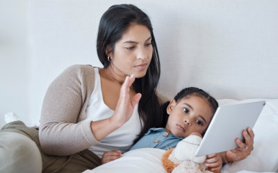 woman and her kid watching on a tablet