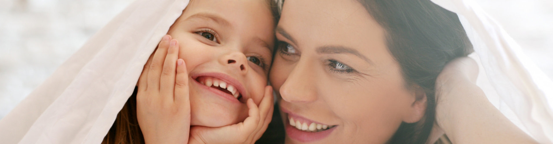 mom and her daughter playing