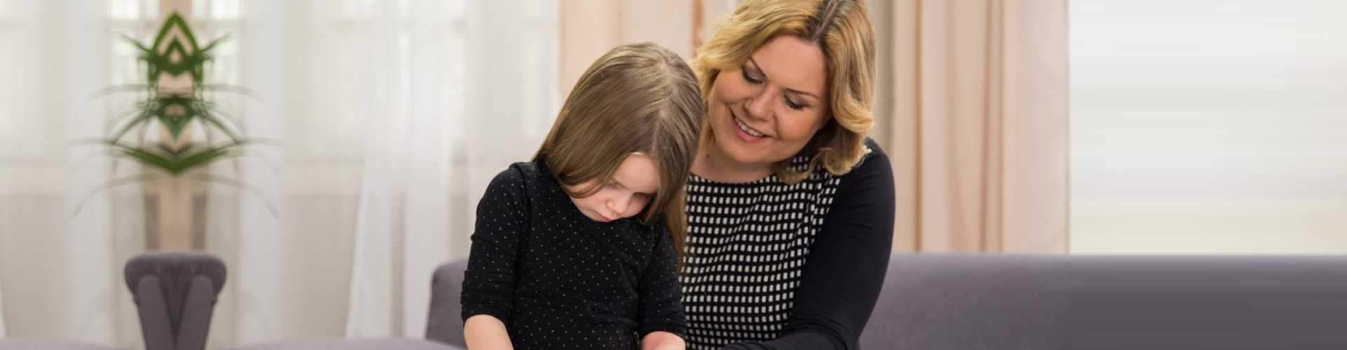 therapist teaching a little girl