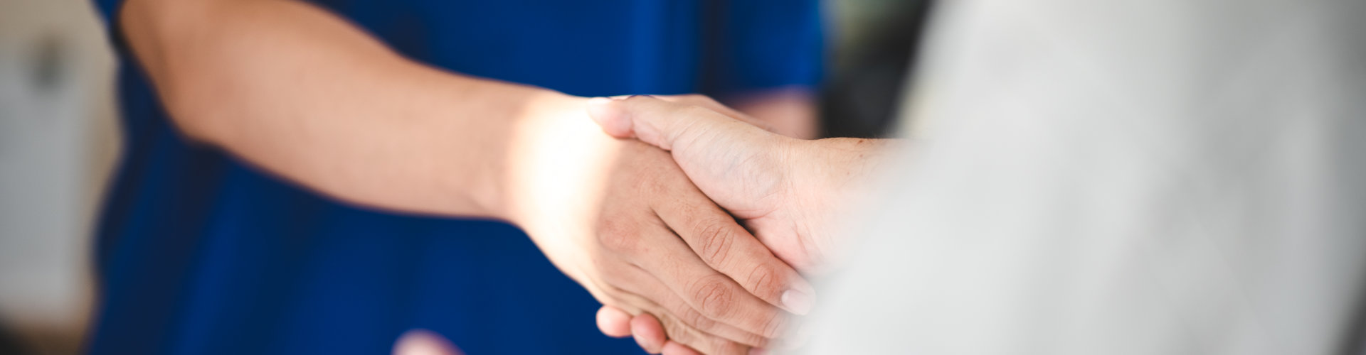 women shaking hands